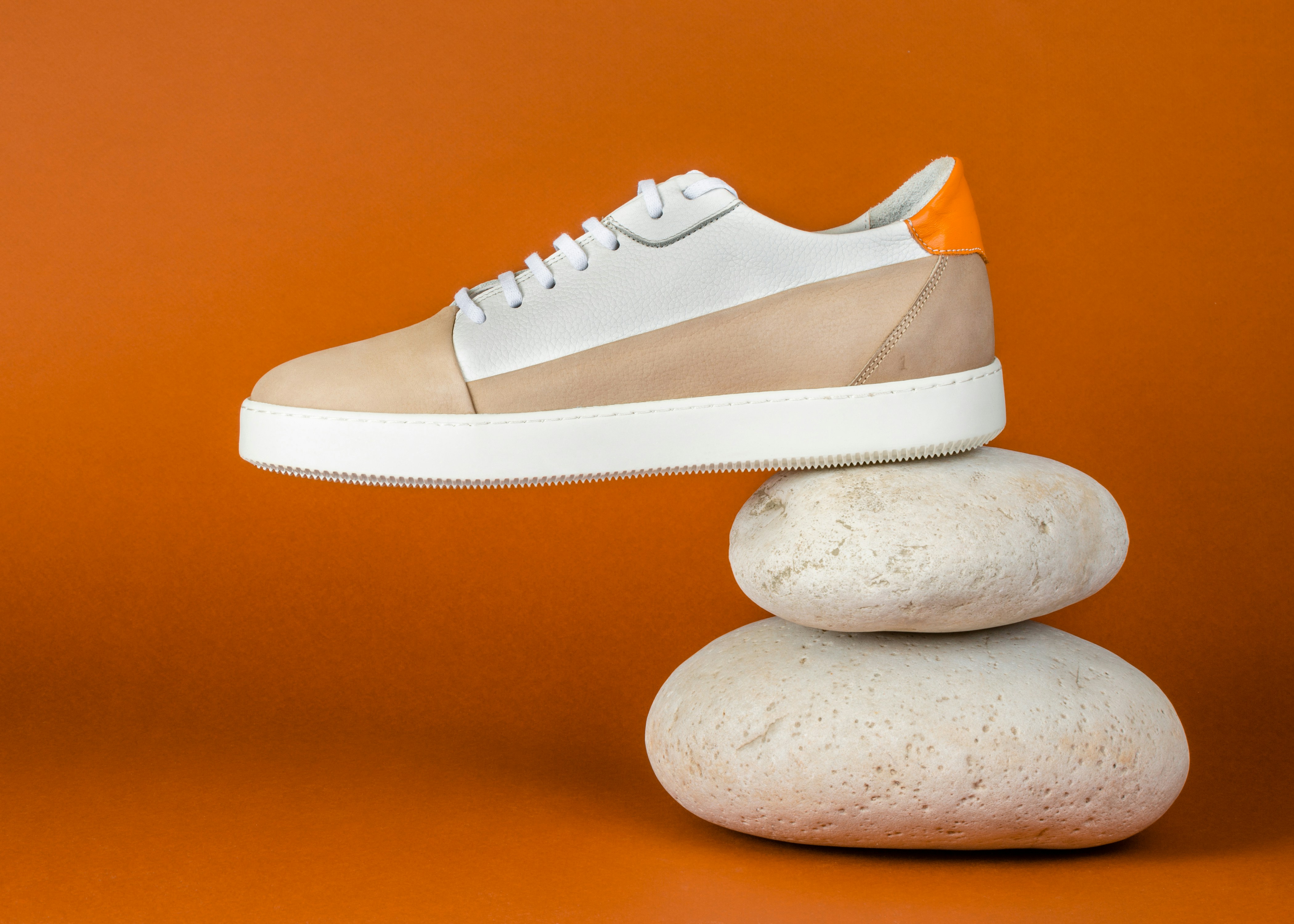 Orange and white trainers